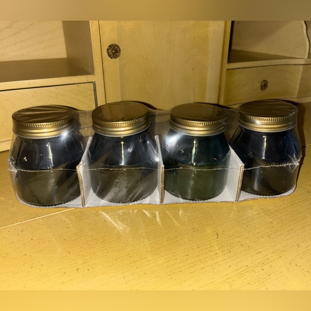 Aniko set of four green glass jars